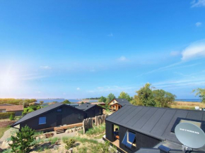 Werder Chalet -- COZYKOJE -- Ostsee Strand 150m I Sauna I eKamin I Tiny House mit Meerblick I 2 Pers und Kind I by 